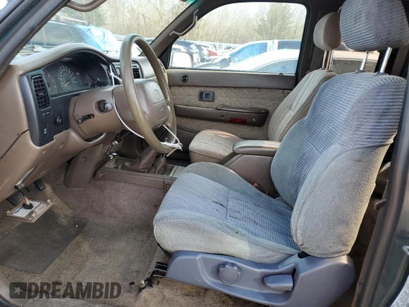 1998 Toyota Tacoma with VIN 4TAWN72N2WZ010087, listed as a Copart auction lot 47650315 with 317,285 mi miles and Salvage Title. Bid and sale history available at DreamBid. Image 7.