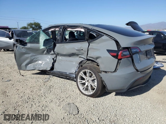 2024 Tesla Model Y Long Range with VIN 7SAYGDEE1RA245642, listed as a Copart auction lot 55490385 with Not provided miles and Salvage title. Bid and sale history available at DreamBid. Image 2.