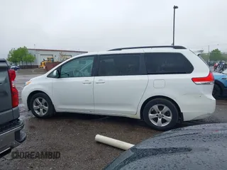 2012 Toyota Sienna LE AAS with VIN 5TDKK3DC3CS208853, listed as a IAAI auction lot 42205012 with 197,286 mi miles. Bid and sale history available at carsss.com. Image 14.