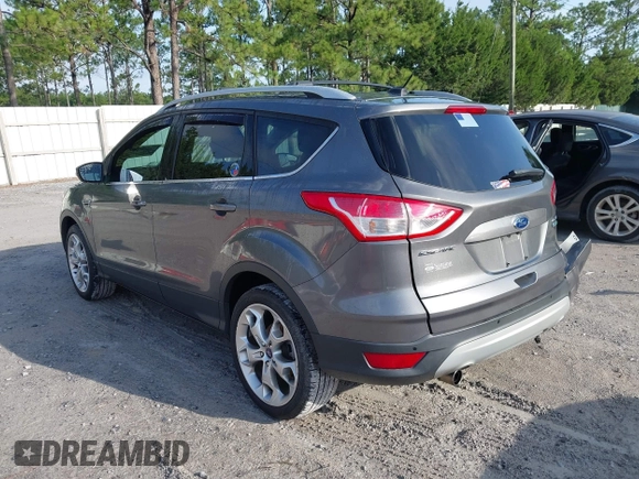 2013 Ford Escape Titanium with VIN 1FMCU0J96DUC31879, listed as a IAAI auction lot 42637019 with 66,096 mi miles and . Bid and sale history available at DreamBid. Image 3.