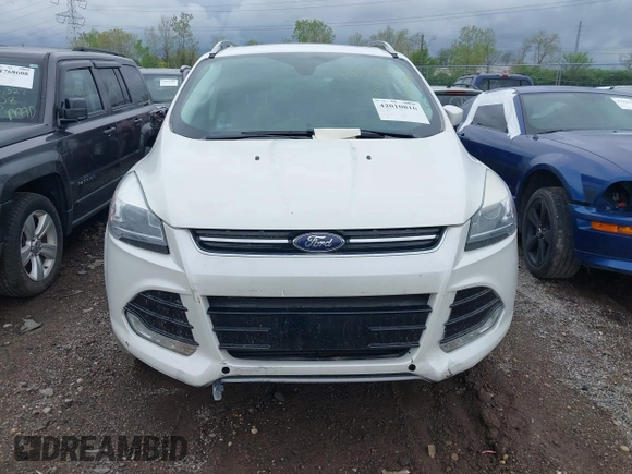 2016 Ford Escape Titanium with VIN 1FMCU9J94GUC22994, listed as a IAAI auction lot 42010816 with 80,293 mi miles. Bid and sale history available at carsss.com. Image 12.