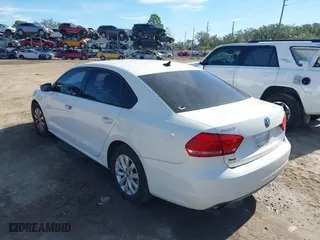 2015 Volkswagen Passat 1.8T Limited Edition with VIN 1VWAT7A38FC043258, listed as a IAAI auction lot 41433514 with 111,169 mi miles. Bid and sale history available at carsss.com. Image 3.