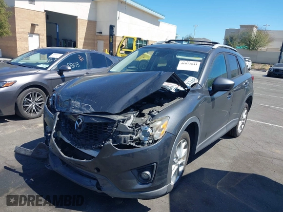 2014 Mazda CX-5 Grand Touring with VIN JM3KE4DY8E0391317, listed as a IAAI auction lot 41871641 with 77,048 mi miles. Bid and sale history available at carsss.com. Image 20.