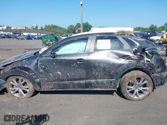 2023 Mazda CX-30 S Carbon Edition with VIN 3MVDMBCM6PM510231, listed as a IAAI auction lot 42579591 with 29,240 mi miles and . Bid and sale history available at DreamBid. Image 14.