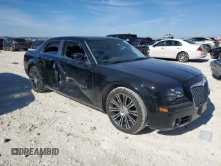 2010 Chrysler 300 with VIN 2C3CA2CV0AH279836, listed as a Copart auction lot 81843694 with 128,515 mi miles and Salvage Title. Bid and sale history available at carsss.com. Image 4.