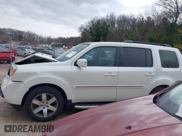 2014 Honda Pilot Touring with VIN 5FNYF4H91EB041614, listed as a IAAI auction lot 42050405 with 158,236 mi miles and . Bid and sale history available at DreamBid. Image 14.