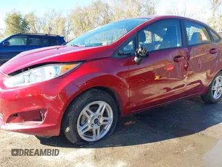 2017 Ford Fiesta SE z VIN 3FADP4BJ6HM143379, wystawiony jako IAAI lot #40863748 z przebiegiem 77 325 mil mil oraz . Historia ofert i sprzedaży dostępna na DreamBid. Obrazek 6.