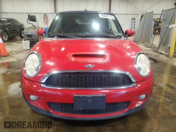2010 MINI Convertible S with VIN WMWMS3C50ATY51636, listed as a Copart auction lot 66097715 with 103,525 mi miles and Salvage title. Bid and sale history available at DreamBid. Image 5.
