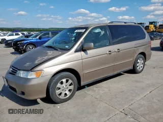 2004 Honda Odyssey EX z VIN 5FNRL18674B007645, wystawiony jako Copart lot #56797535 z przebiegiem 243 256 mil mil oraz Szkoda całkowita • Salvage title. Historia ofert i sprzedaży dostępna na DreamBid. Obrazek 1.