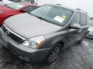 2011 Kia Sedona EX with VIN KNDMH4C71B6396661, listed as a IAAI auction lot 41412771 with 175,192 mi miles. Bid and sale history available at carsss.com. Image 2.