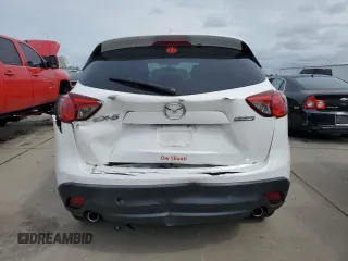 2016 Mazda CX-5 Touring with VIN JM3KE2CYXG0777715, listed as a Copart auction lot 52157005 with 58,585 mi miles and Salvage Title. Bid and sale history available at carsss.com. Image 6.