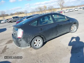 2007 Toyota Prius with VIN JTDKB20U277563120, listed as a IAAI auction lot 40736242 with 315,489 mi miles. Bid and sale history available at carsss.com. Image 4.