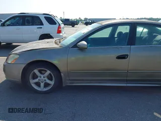 2005 Nissan Altima SE z VIN 1N4BL11D95N437079, wystawiony jako IAAI lot #42399612 z przebiegiem 296 135 mil mil oraz . Historia ofert i sprzedaży dostępna na DreamBid. Obrazek 14.