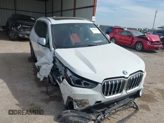 2023 BMW X1 xDrive28i with VIN WBX73EF07P5W32455, listed as a IAAI auction lot 41825701 with 12,453 mi miles and . Bid and sale history available at DreamBid. Image 1.