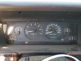 1998 Jeep Grand Cherokee Laredo with VIN 1J4GZ58S5WC165213, listed as a Copart auction lot 77611434 with 168,688 mi miles and Salvage Title. Bid and sale history available at carsss.com. Image 9.