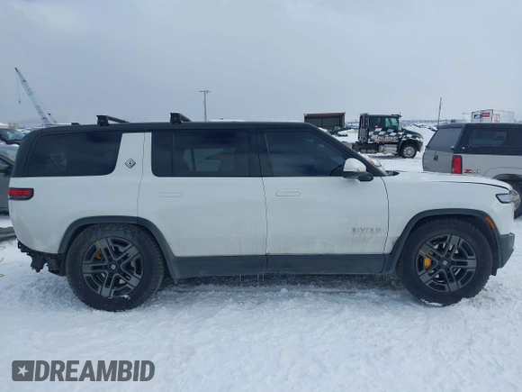 2023 Rivian R1S Adventure z VIN 7PDSGABA9PN015327, wystawiony jako IAAI lot #41484133 z przebiegiem Nie podano mil oraz . Historia ofert i sprzedaży dostępna na DreamBid. Obrazek 14.