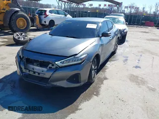 2021 Nissan Maxima SV z VIN 1N4AA6CV4MC508977, wystawiony jako IAAI lot #41858232 z przebiegiem 66 113 mil mil oraz . Historia ofert i sprzedaży dostępna na DreamBid. Obrazek 2.