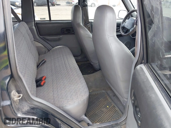 1998 Jeep Cherokee Sport with VIN 1J4FJ68S3WL285200, listed as a IAAI auction lot 41834529 with 335,881 mi miles and . Bid and sale history available at DreamBid. Image 8.