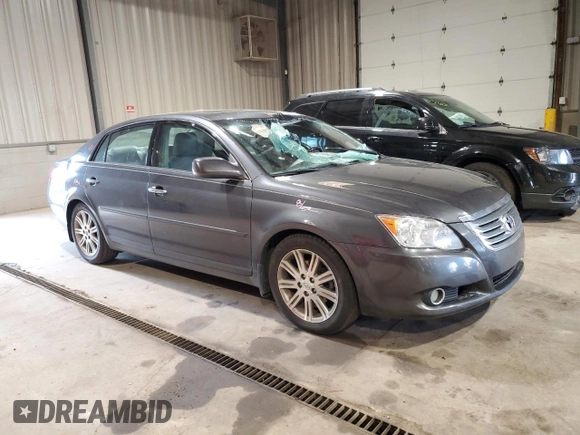 2010 Toyota Avalon XL with VIN 4T1BK3DB3AU360692, listed as a Copart auction lot 54888765 with 139,878 mi miles and Salvage Title. Bid and sale history available at carsss.com. Image 4.