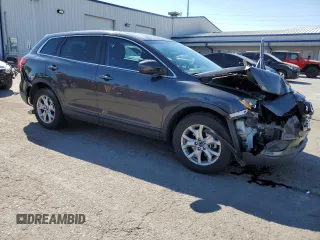 2015 Mazda CX-9 Sport with VIN JM3TB2BV7F0469064, listed as a Copart auction lot 74280004 with 140,270 mi miles and Salvage title. Bid and sale history available at DreamBid. Image 4.