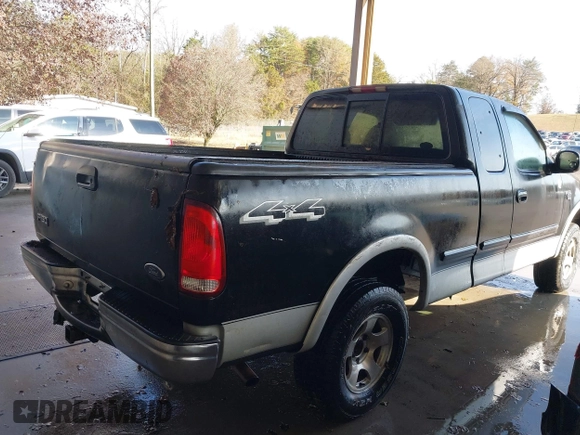 2000 Ford F-150 XL with VIN 1FTRX18LXYNA19385, listed as a IAAI auction lot 41075391 with 214,624 mi miles and . Bid and sale history available at DreamBid. Image 4.