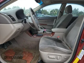 2005 Toyota Camry LE with VIN 4T1BE30KX5U086586, listed as a Copart auction lot 60291715 with 180,421 mi miles and Salvage title. Bid and sale history available at DreamBid. Image 7.