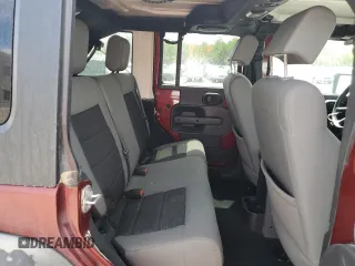 2010 Jeep Wrangler Unlimited Rubicon with VIN 1J4BA6H14AL115460, listed as a Copart auction lot 58349925 with Not provided miles and Salvage title. Bid and sale history available at DreamBid. Image 11.