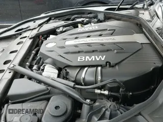2012 BMW 7 Series 750i with VIN WBAKA8C58CDX01276, listed as a IAAI auction lot 43156573 with 115,967 mi miles and . Bid and sale history available at DreamBid. Image 12.