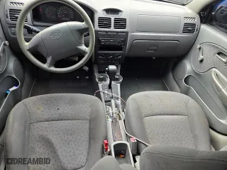 2004 Kia Rio with VIN KNADC125546325654, listed as a Copart auction lot 65521594 with 157,436 mi miles and Salvage Title. Bid and sale history available at carsss.com. Image 7.