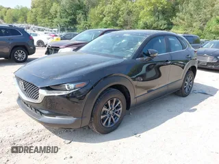 2021 Mazda CX-30 S with VIN 3MVDMBAL6MM264948, listed as a IAAI auction lot 42263077 with 13,614 mi miles and . Bid and sale history available at DreamBid. Image 19.