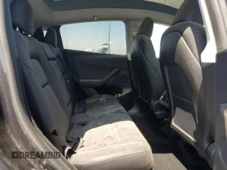 2024 Tesla Model Y with VIN 7SAYGDED1RF052031, listed as a Copart auction lot 61806195 with 5,365 mi miles and Salvage title. Bid and sale history available at DreamBid. Image 11.