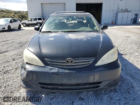 2002 Toyota Camry XLE z VIN 4T1BF30K12U020467, wystawiony jako Copart lot #54628995 z przebiegiem 222 898 mil mil oraz Szkoda całkowita • Salvage title. Historia ofert i sprzedaży dostępna na DreamBid. Obrazek 5.