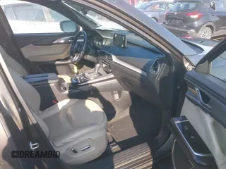 2016 Mazda CX-9 Grand Touring z VIN JM3TCBDY3G0104001, wystawiony jako IAAI lot #41961054 z przebiegiem 77 057 mil mil oraz . Historia ofert i sprzedaży dostępna na DreamBid. Obrazek 5.