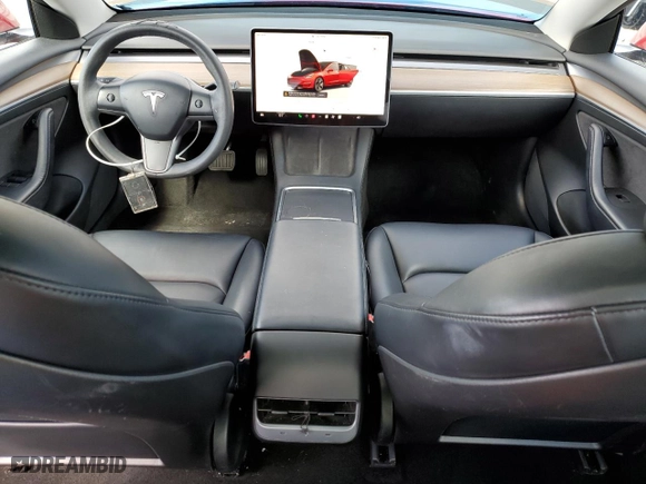 2023 Tesla Model 3 with VIN 5YJ3E1EA9PF447427, listed as a Copart auction lot 51603385 with 99,593 mi miles and Non Repairable. Bid and sale history available at carsss.com. Image 8.