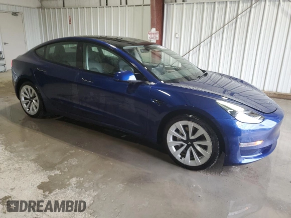 2022 Tesla Model 3 with VIN 5YJ3E1EA7NF369551, listed as a Copart auction lot 55610805 with 128,311 mi miles and Clean Title. Bid and sale history available at DreamBid. Image 4.