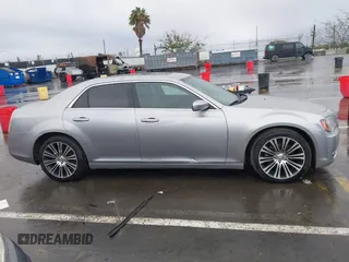 2013 Chrysler 300 with VIN 2C3CCABG3DH736120, listed as a IAAI auction lot 41765794 with 126,268 mi miles. Bid and sale history available at carsss.com. Image 13.