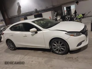 2018 Mazda 3 Touring z VIN 3MZBN1V32JM188650, wystawiony jako IAAI lot #41428819 z przebiegiem 225 611 mil mil oraz . Historia ofert i sprzedaży dostępna na DreamBid. Obrazek 13.