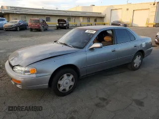 1995 Toyota Camry LE with VIN 4T1GK12E9SU088139, listed as a Copart auction lot 74628054 with 168,859 mi miles and Salvage Title. Bid and sale history available at carsss.com. Image 1.