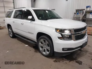2019 Chevrolet Suburban LT with VIN 1GNSKHKC4KR267091, listed as a IAAI auction lot 41116625 with 93,101 mi miles and . Bid and sale history available at DreamBid. Image 1.