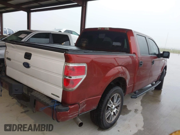 2014 Ford F-150 XL with VIN 1FTFW1CF1EKD58198, listed as a IAAI auction lot 42086106 with 401,943 mi miles. Bid and sale history available at carsss.com. Image 13.