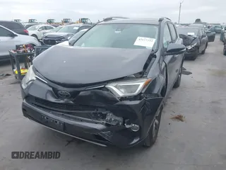 2018 Toyota RAV4 XLE with VIN 2T3WFREV1JW512476, listed as a IAAI auction lot 42177733 with 132,207 mi miles and . Bid and sale history available at DreamBid. Image 17.