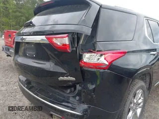 2020 Chevrolet Traverse High Country with VIN 1GNERNKW3LJ186049, listed as a IAAI auction lot 42010235 with 125,847 mi miles and . Bid and sale history available at DreamBid. Image 6.