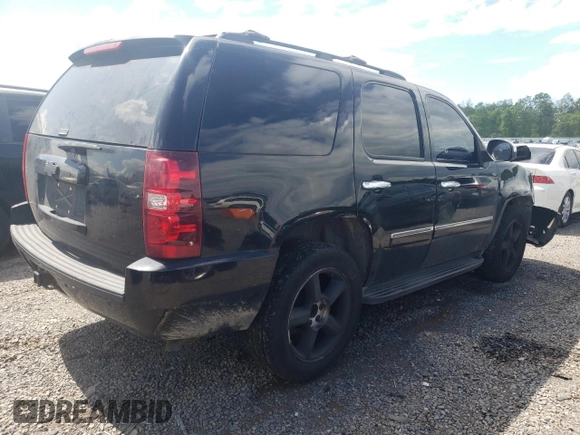 2009 Chevrolet Tahoe LTZ with VIN 1GNFK33039J125428, listed as a Copart auction lot 57962875 with 245,554 mi miles and Salvage title. Bid and sale history available at DreamBid. Image 3.