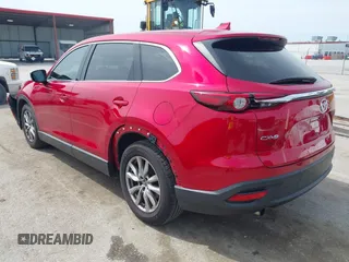 2016 Mazda CX-9 Touring with VIN JM3TCACY4G0112961, listed as a IAAI auction lot 42094718 with 114,679 mi miles and . Bid and sale history available at DreamBid. Image 3.