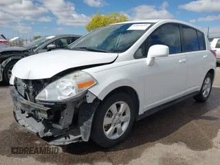 2009 Nissan Versa 1.8 S with VIN 3N1BC13E19L371006, listed as a IAAI auction lot 42064633 with 67,424 mi miles. Bid and sale history available at carsss.com. Image 18.