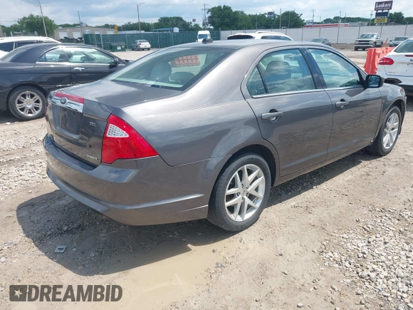 2012 Ford Fusion SEL z VIN 3FAHP0JG4CR265377, wystawiony jako IAAI lot #42221191 z przebiegiem 154 442 mil mil oraz . Historia ofert i sprzedaży dostępna na DreamBid. Obrazek 4.