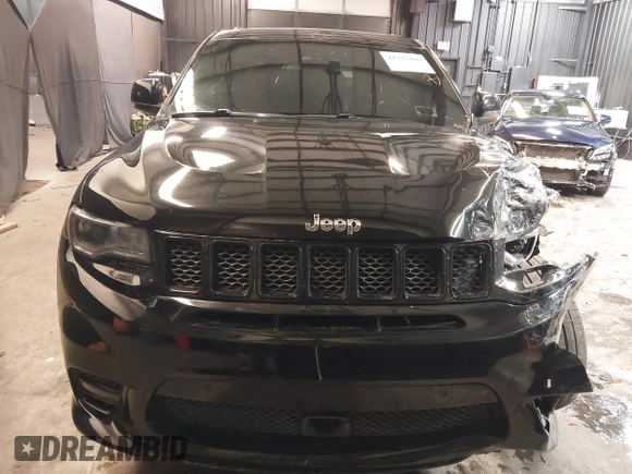 2017 Jeep Grand Cherokee SRT with VIN 1C4RJFDJ9HC819478, listed as a IAAI auction lot 41325490 with 63,551 mi miles. Bid and sale history available at carsss.com. Image 12.