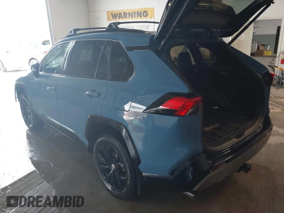 2022 Toyota RAV4 Hybrid SE with VIN 4T3T6RFV3NU089343, listed as a IAAI auction lot 41223554 with 50,589 mi miles and . Bid and sale history available at DreamBid. Image 3.