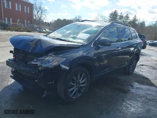 2015 Mazda CX-9 Grand Touring with VIN JM3TB3DV7F0456348, listed as a IAAI auction lot 41431063 with 193,151 mi miles. Bid and sale history available at carsss.com. Image 2.