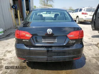 2012 Volkswagen Jetta S with VIN 3VW2K7AJXCM473938, listed as a Copart auction lot 53061685 with 87,881 mi miles and Salvage title. Bid and sale history available at DreamBid. Image 6.